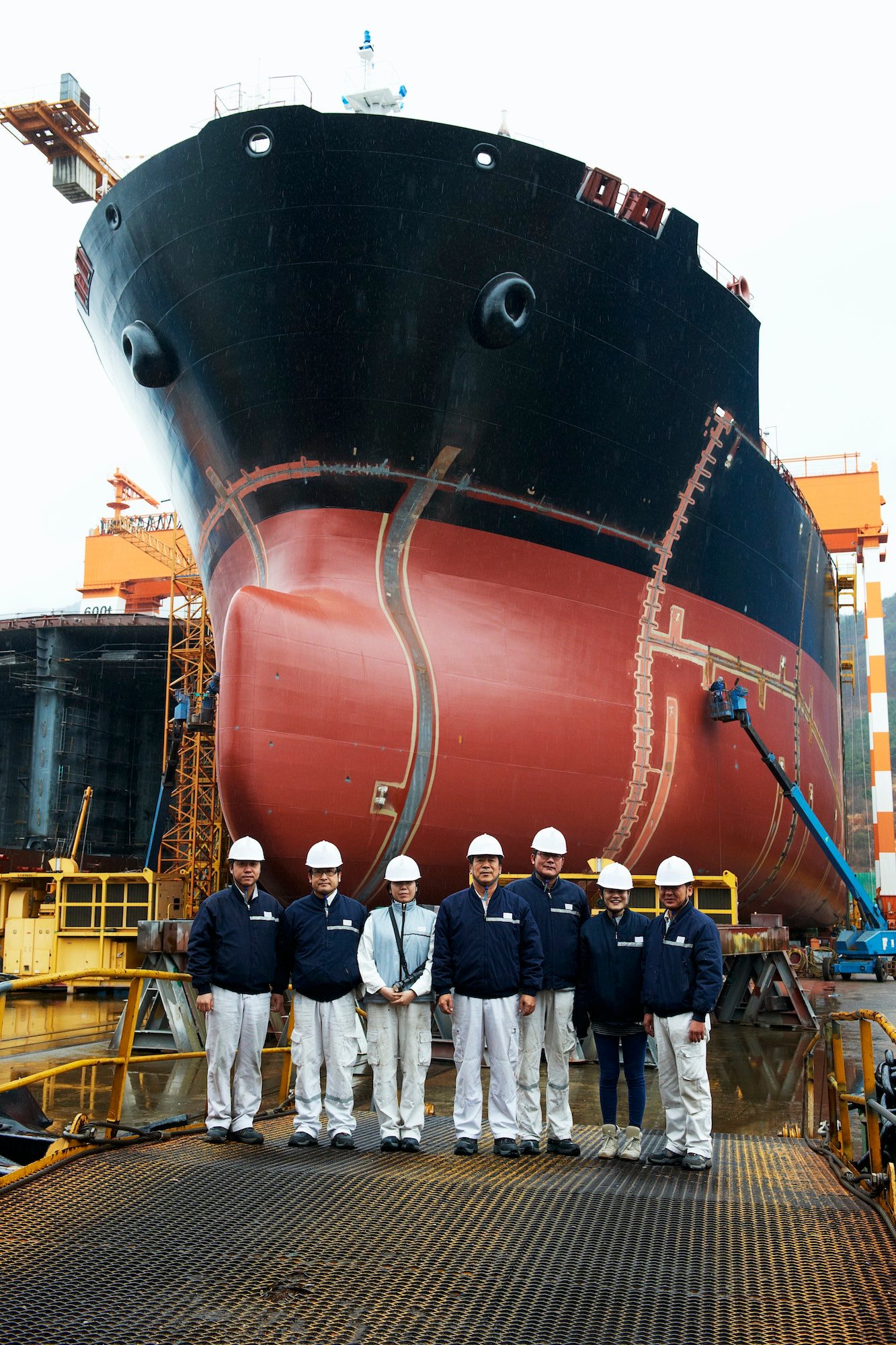 Portrait of workers at shipyard, GoSeong-gun, South Korea